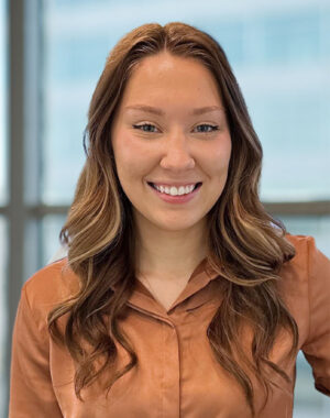 a woman smiling at camera