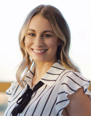 a woman smiling at camera