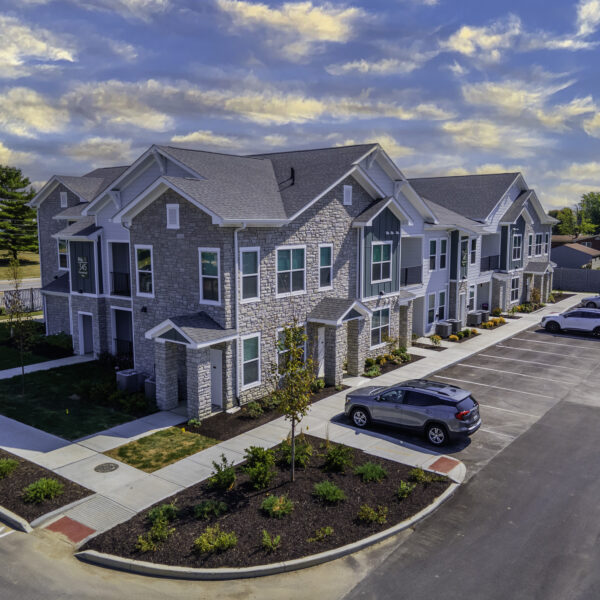 a building with cars parked in front of it