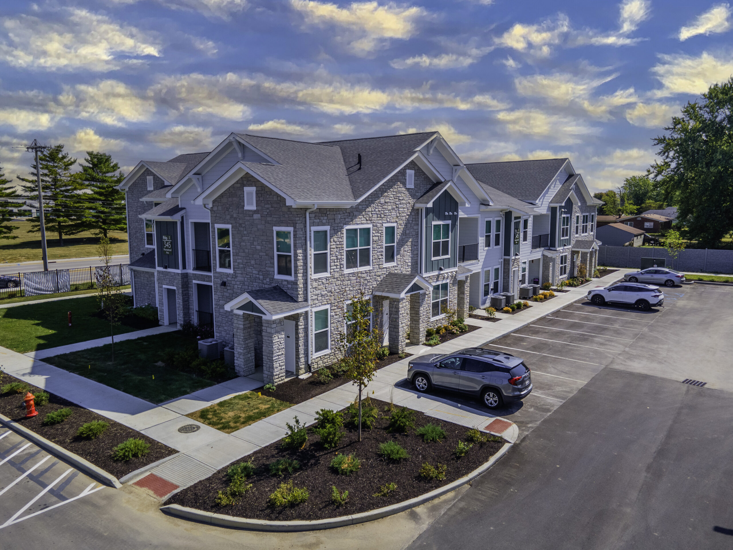 a building with cars parked in front of it