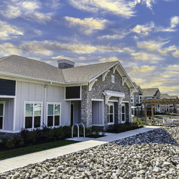 a house with a stone driveway