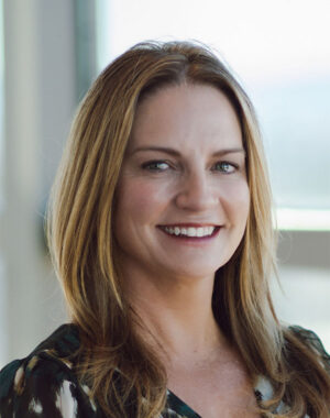 a woman smiling at camera