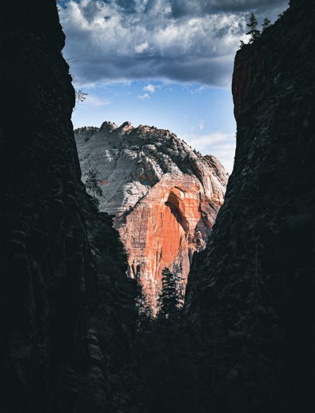 a rocky canyon with a large rock formation