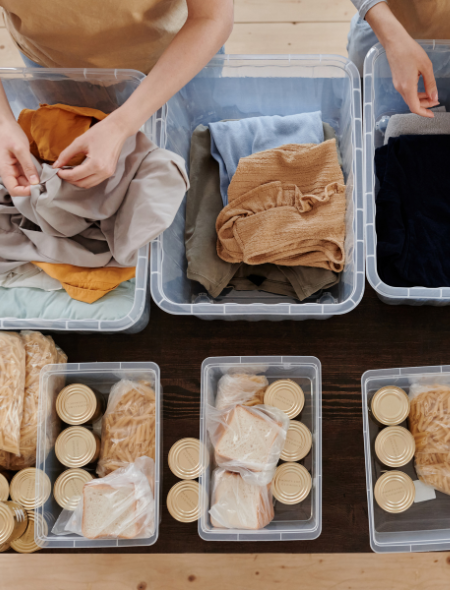 a group of plastic containers with food in them